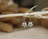 Flower-shaped earrings with gemstones