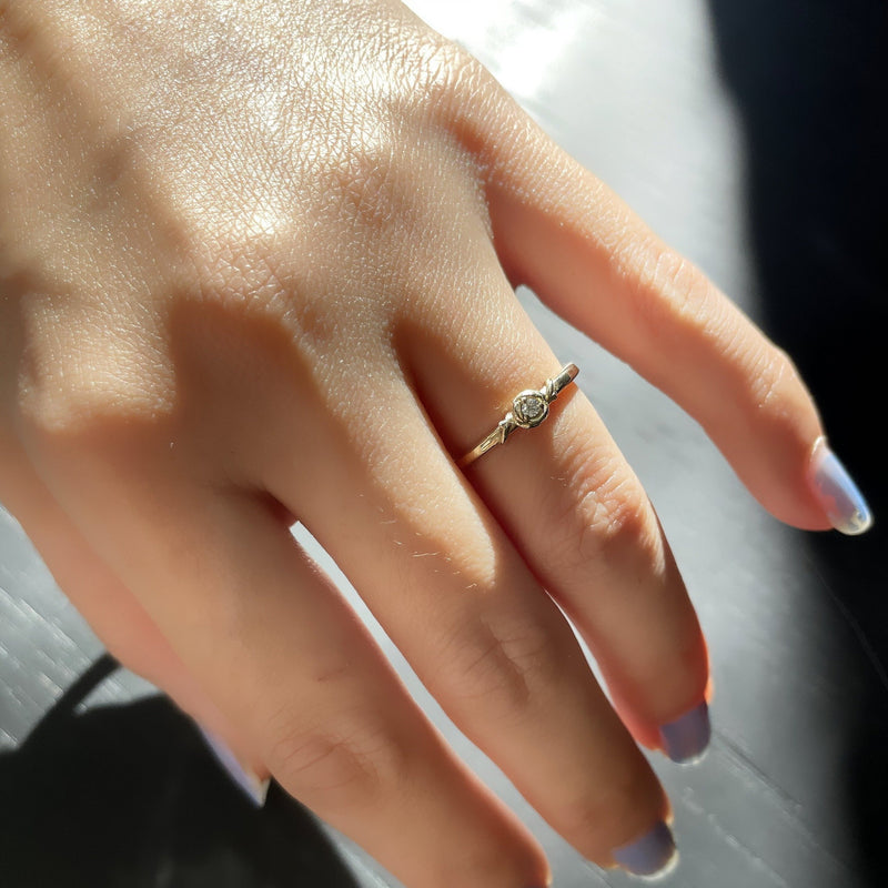 Baby Rose Diamond Ring in yellow gold shown on hand