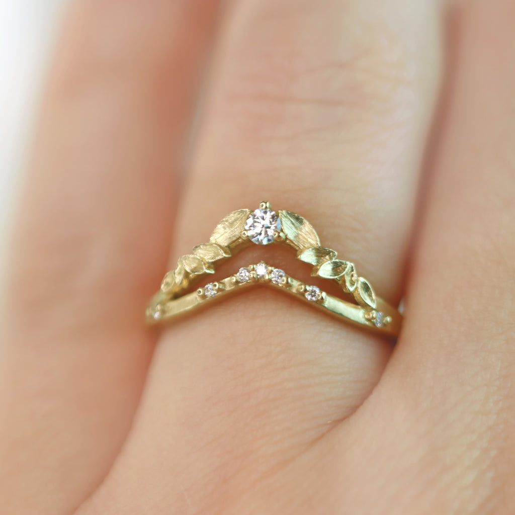 Bayleaf gold diamond curved band on hand