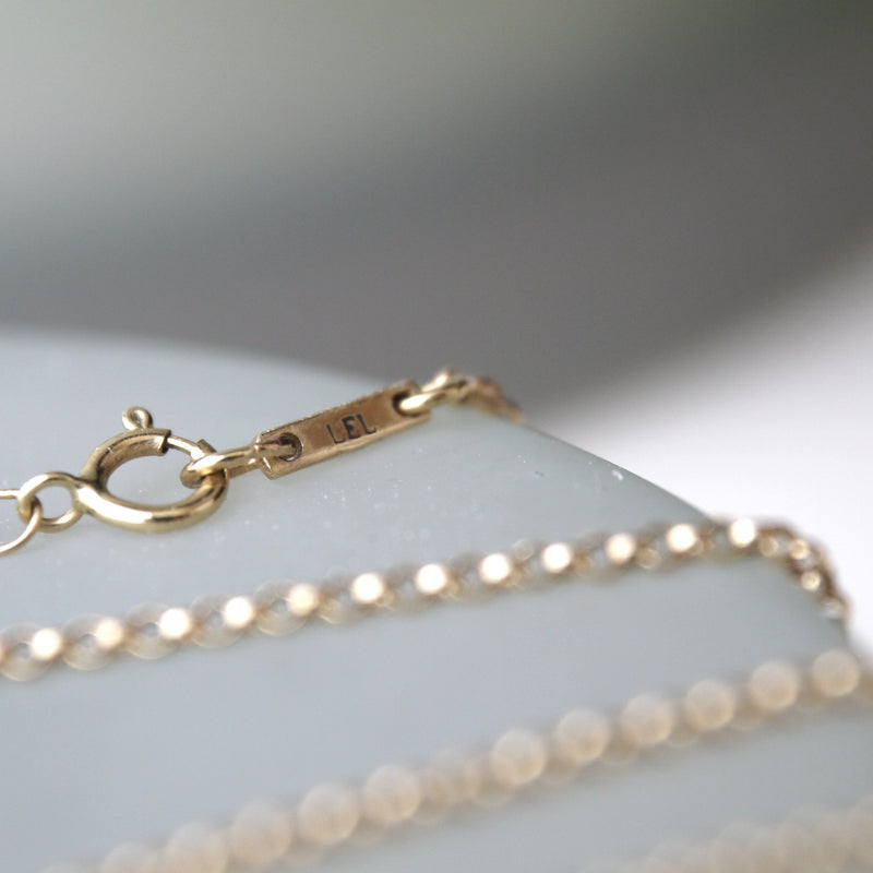 Reflection Baguette Moissanite Two-Tone Gold Necklace Vertical